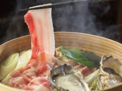 Steaming in a bamboo steamer keeps the umami (savory taste) of Agu from escaping.