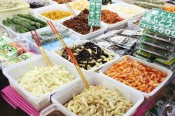 A variety of fruits and local vegetables grown only in Okinawa. Okinawan shallots and ”sea-grapes” are quite popular and worth a try.