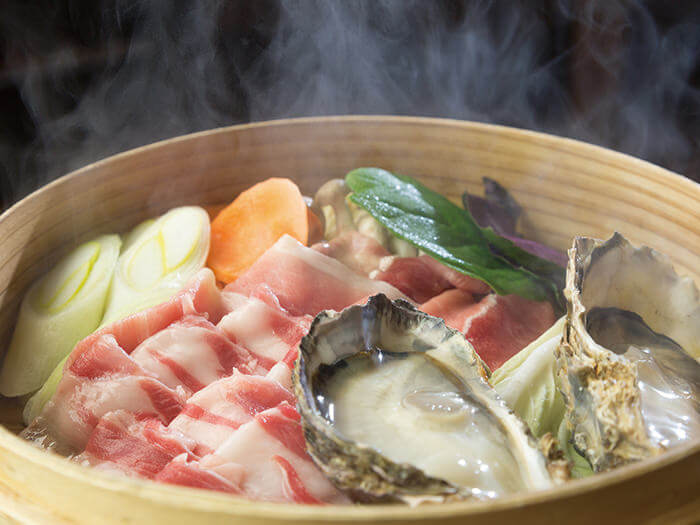 Steaming in a bamboo steamer keeps the umami (savory taste) of Agu from escaping.