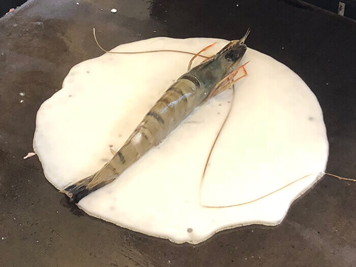 A large shrimp is also pressed whole.