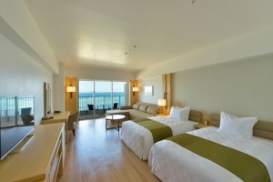 Ocean Twin Room (50 square meters) The white, natural décor complements the beautiful view of Ie Island out the window.